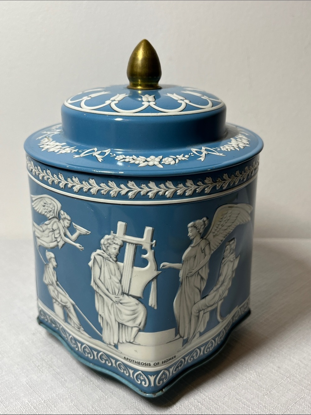 vintage Riley's toffee tin canister 
England, embossed "Apotheosis of Homer"